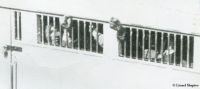 Close up of photo of Mandela being transported from the Rivonia Trial courthouse