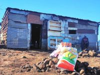 Food parcels outside a house in Pongola