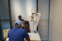 Dr Tebogo Maleka checks Mabel Maleka's (no relation) eyes ahead of operating to restore her eyesight.