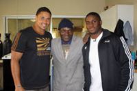 Thomas Williams and Reggie Bush, with Leonard Thuma (centre)