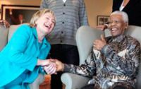 Hillary Cliunton and Mandela, laughing