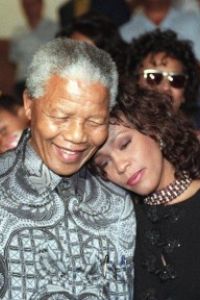 Madiba 230696 Nelson Mandela Hugs Whitney Houston At His House In Pretoria Thumb