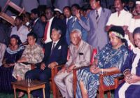 Nelson Mandela sits with the Nyereres, Winnie Madikizela-Mandela, Ruth Mompati, Andrew Mlangeni and others at a reception ceremony, Tanzania 1990