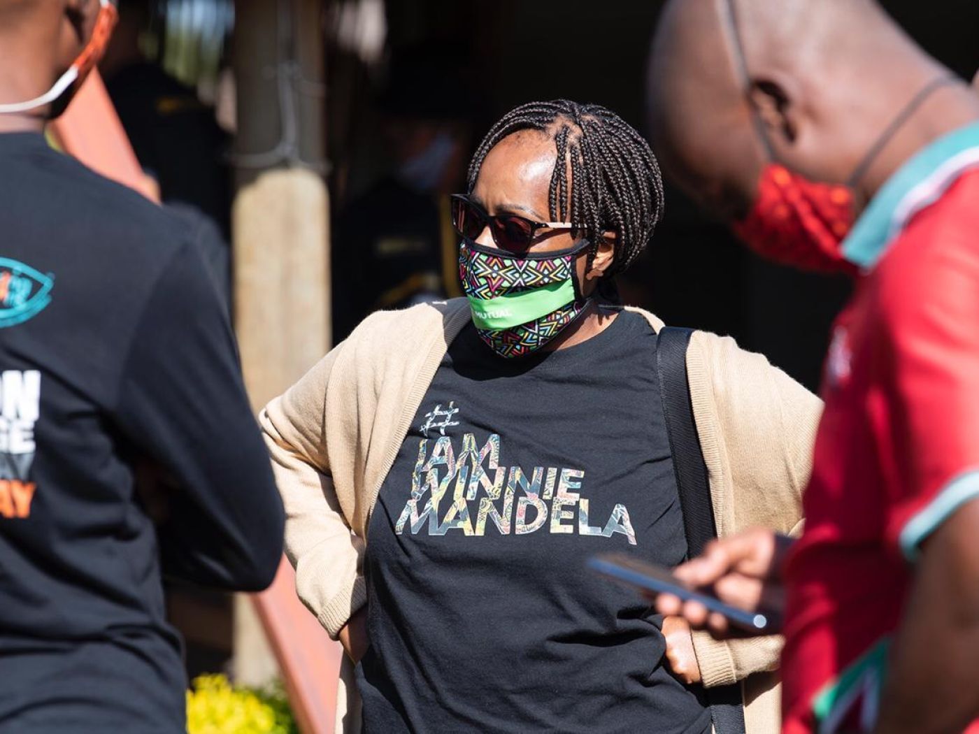 Woman wearing a Team Winnie Mandela t'shirt at an E1F1 food distribution event