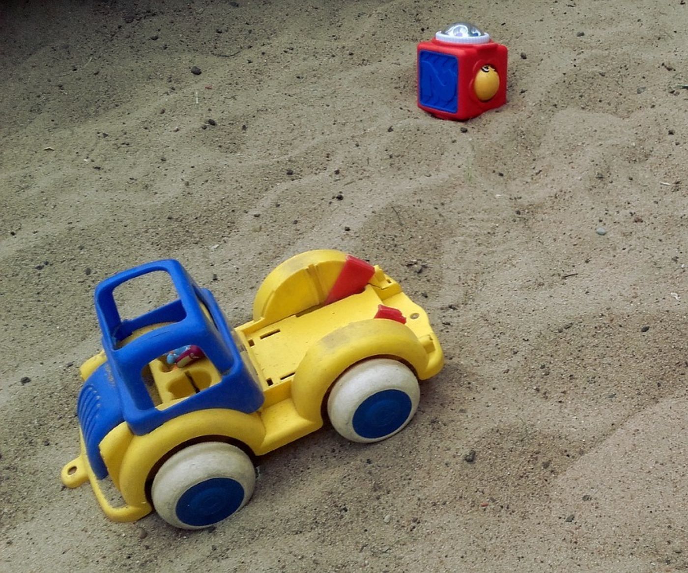 Toys in a sandpit