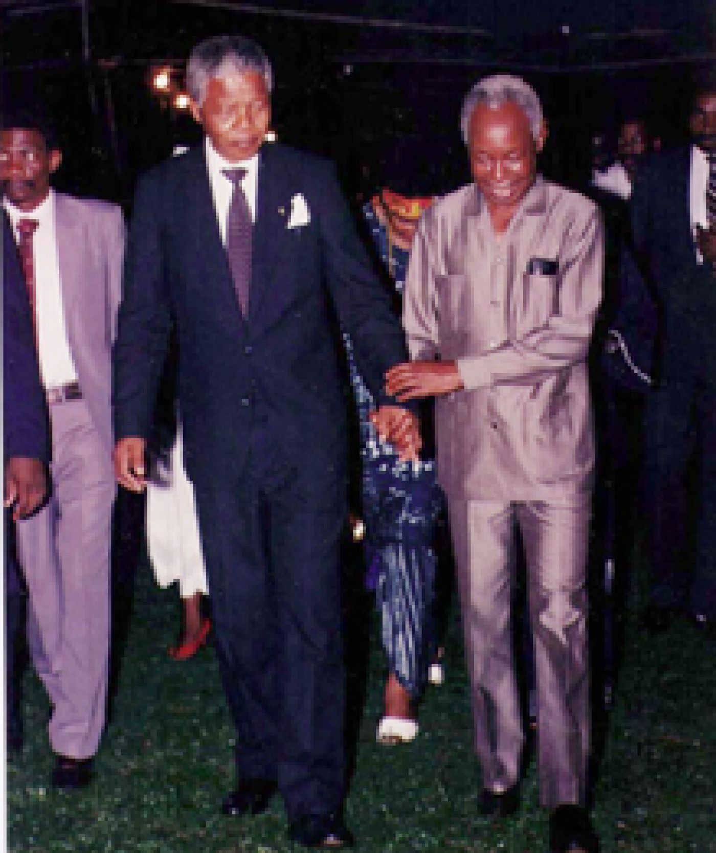 Nelson Mandela and Julius Nyerere walk together